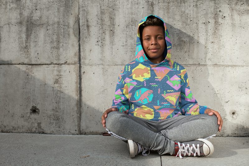 Young boy wearing an all-over-print kids hoodie by Hoodie Lab