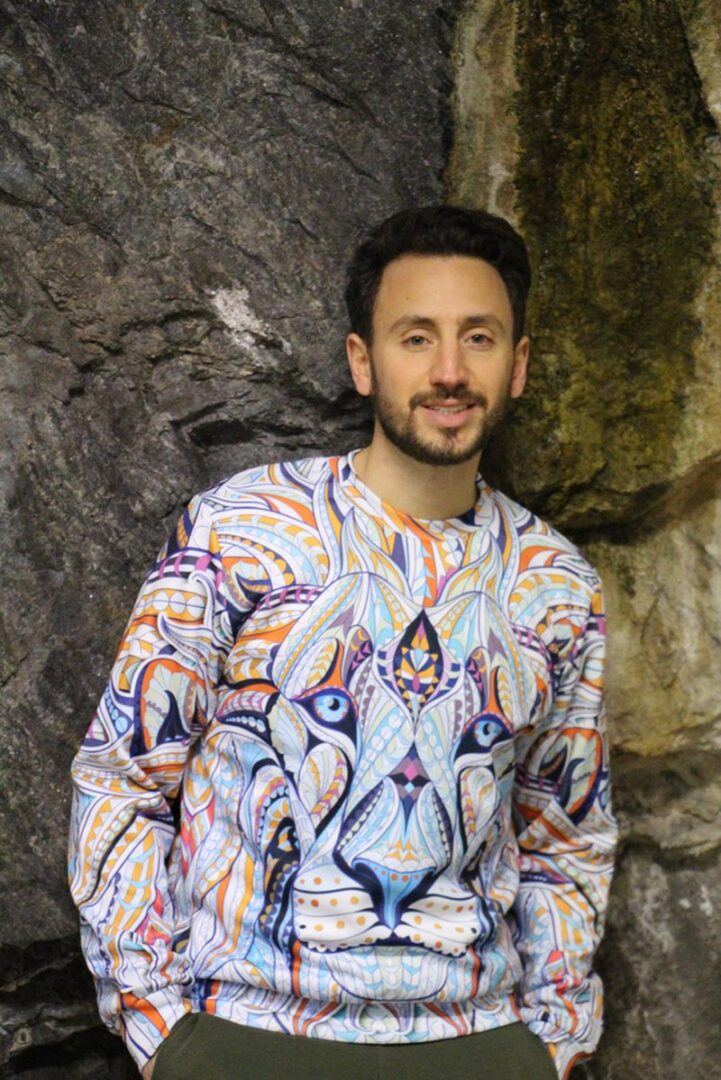 Man wearing an all-over-print sweatshirt by Hoodie Lab