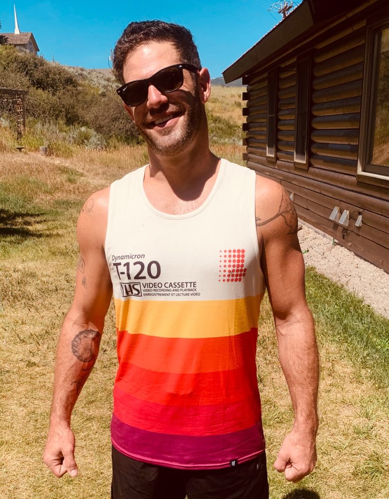 Man wearing an all-over-print tank top by Hoodie Lab