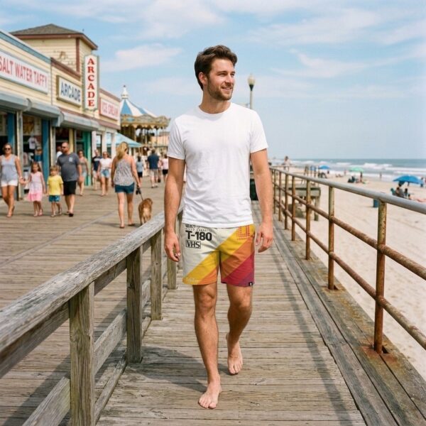 Man wearing VHS Cassette V35 shorts on a boardwalk
