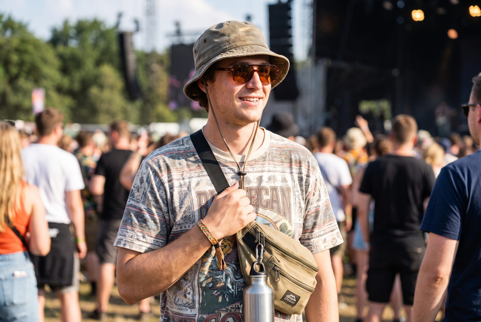 Festival accessories for men: cross-body bag, bucket hat and sunglasses